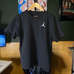 Jordan Black Tee with Red Jumpman Logo contouring tee men’s M